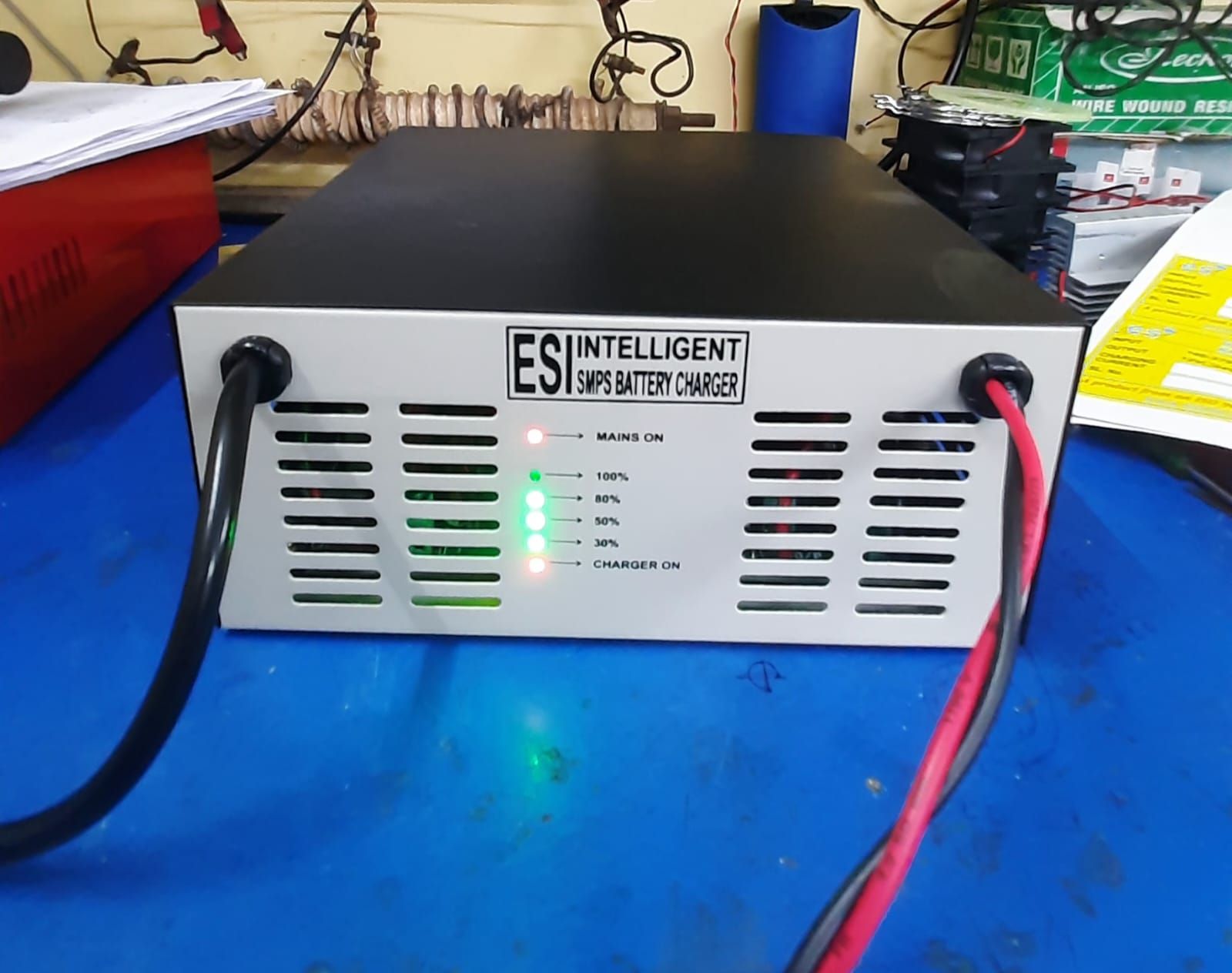 How does the Indian Climate affect Battery Charging, and how do SMPS Battery Chargers Help?